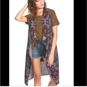 Multi colored sleeveless vest